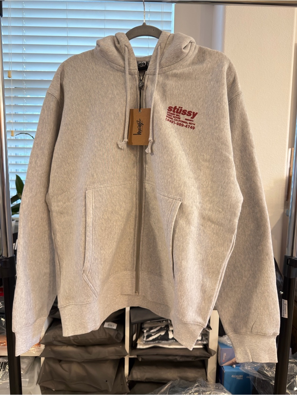 Stussy Men's Zip-Up Hoodie in Light Gray with Red Logo